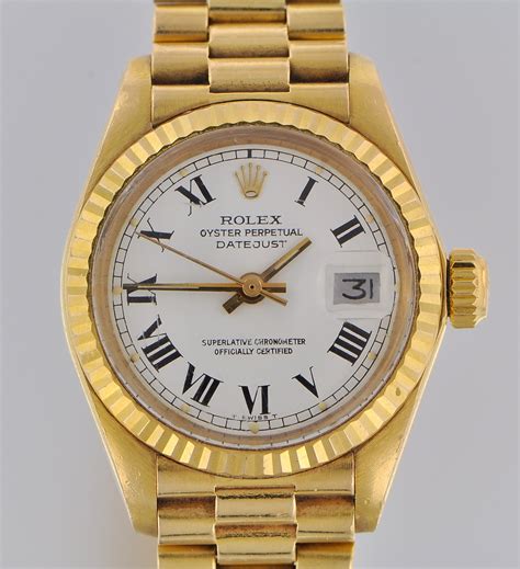 ladies 18k Rolex oyster perpetual